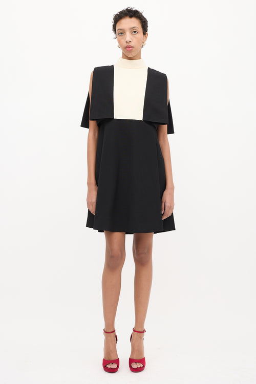 Valentino Black 
Cream Wool Cape Overlay Dress