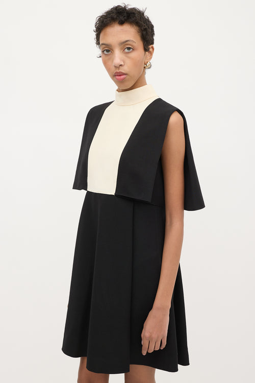 Valentino Black 
Cream Wool Cape Overlay Dress