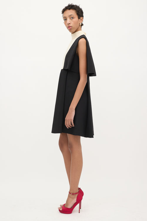 Valentino Black 
Cream Wool Cape Overlay Dress