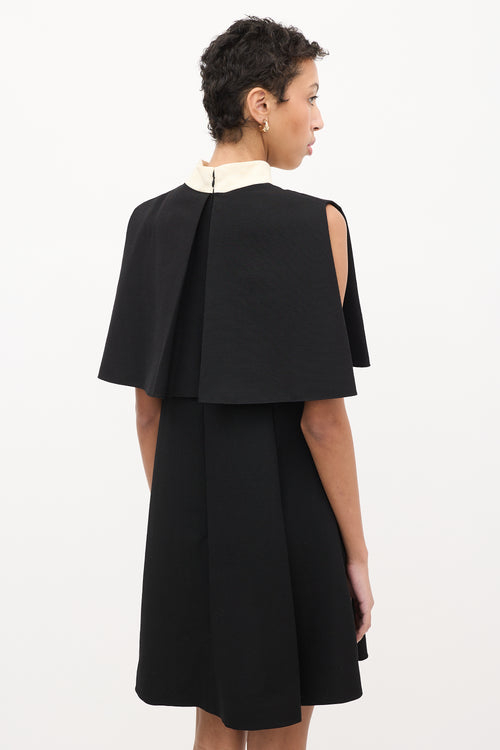 Valentino Black 
Cream Wool Cape Overlay Dress