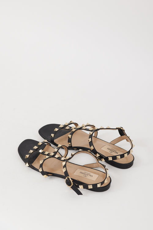 Valentino Black 
Gold Leather Rockstud Caged Sandal