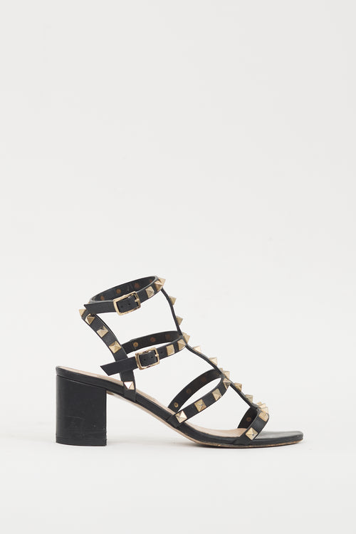 Valentino Black 
Gold Leather Rockstud Sandal