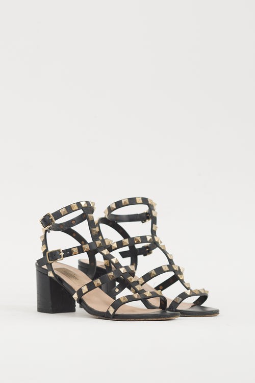 Valentino Black 
Gold Leather Rockstud Sandal