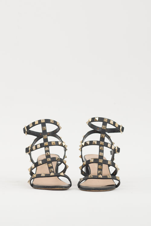 Valentino Black 
Gold Leather Rockstud Sandal