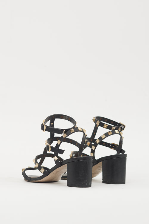 Valentino Black 
Gold Leather Rockstud Sandal