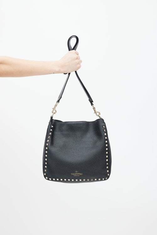 Valentino Black 
Gold Rockstud Flip Lock Leather Bag