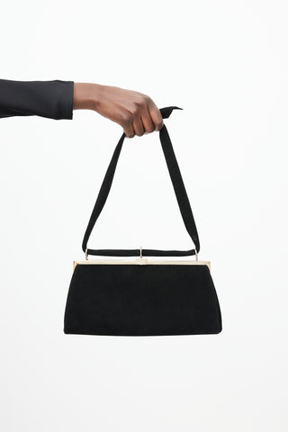 Valentino Black 
Gold Suede Knotted Bag