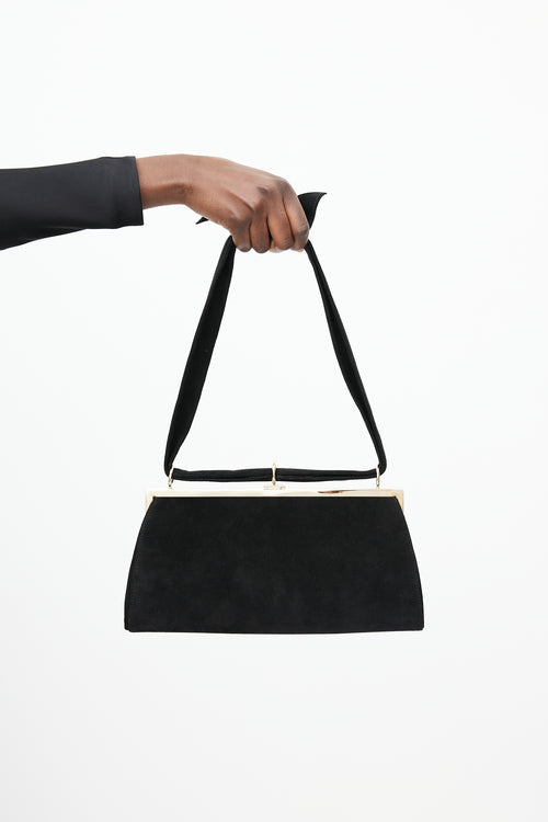 Valentino Black 
Gold Suede Knotted Bag