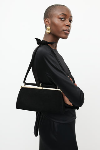 Valentino Black 
Gold Suede Knotted Bag