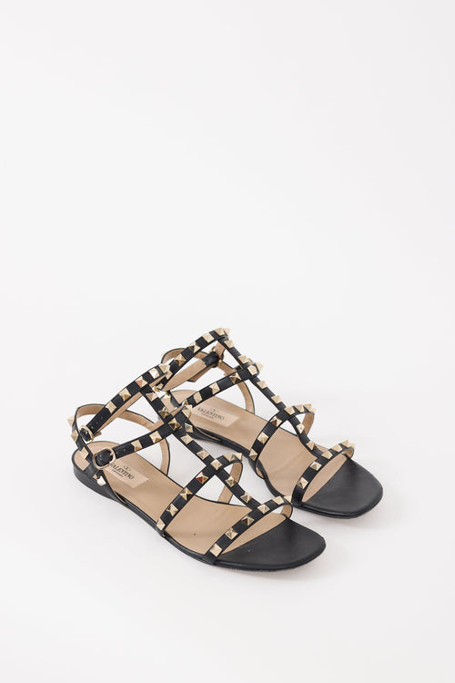 Valentino Black 
Gold Rockstud Caged Sandal