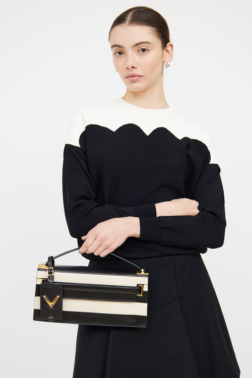 Valentino Black 
White Stripe My Rockstud Clutch