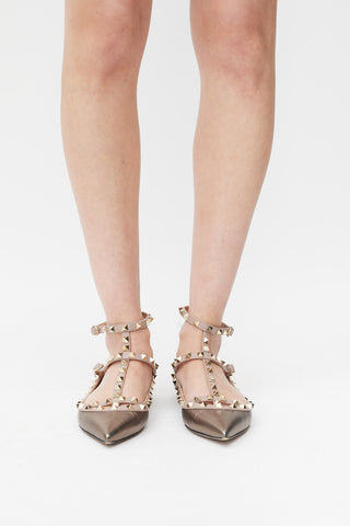 Valentino Brown 
Pink Metallic Leather Rockstud Caged Ballet Flat