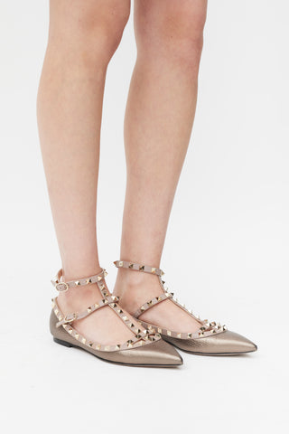 Valentino Brown 
Pink Metallic Leather Rockstud Caged Ballet Flat