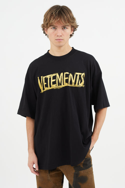 Vetements Black 
Gold World Tour T-Shirt