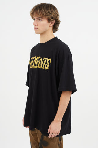 Vetements Black 
Gold World Tour T-Shirt