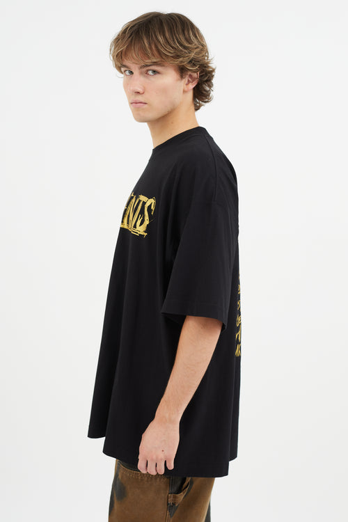 Vetements Black 
Gold World Tour T-Shirt