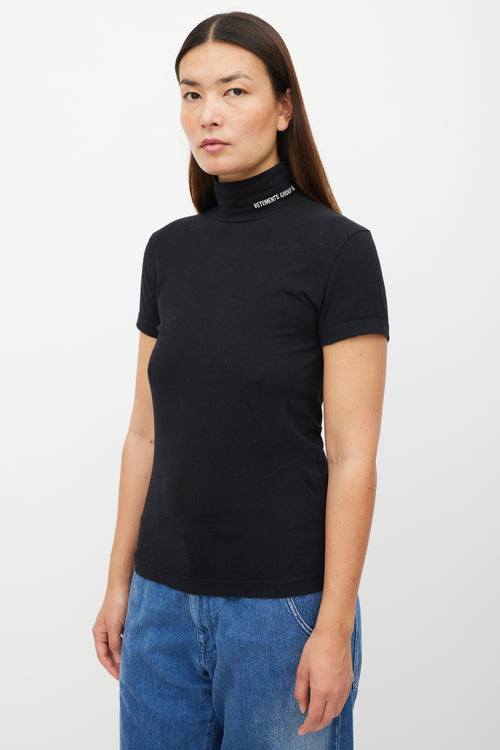 Vetements Black 
White Logo Mock Neck Top