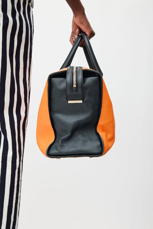 Victoria Beckham Orange 
Black Leather Bag