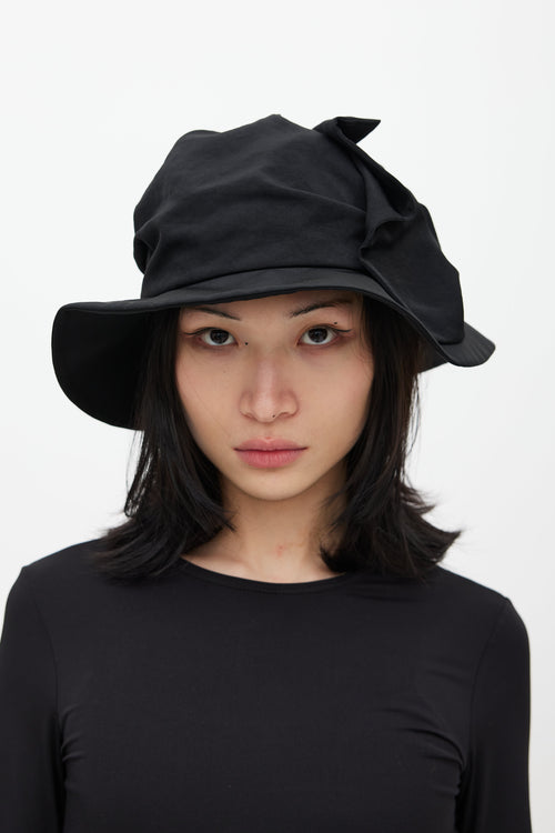 Y
s Black Ruffled Hat