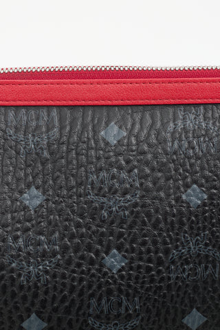 MCM Black 
Red Monogram Crossbody Pouch