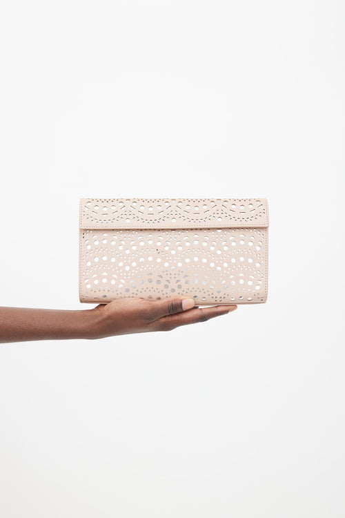 Alaïa Beige Lazer Cut 
Silver-Tone Clutch