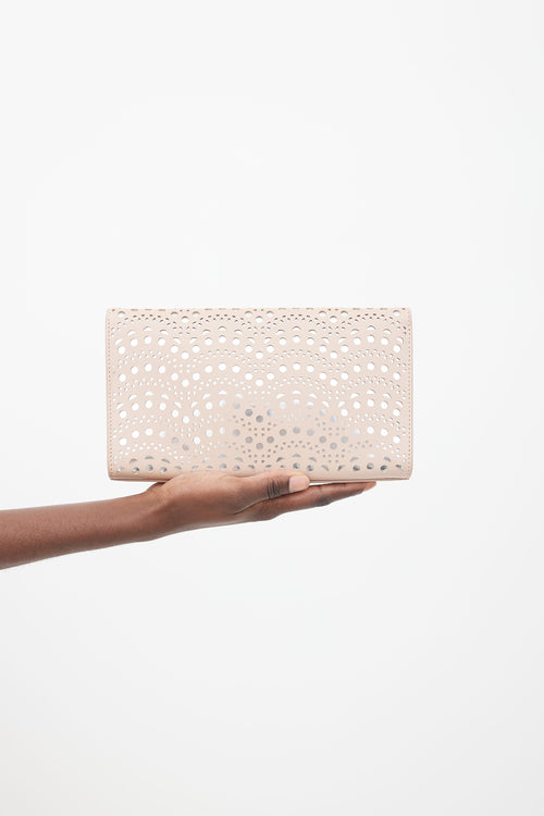 Alaïa Beige Lazer Cut 
Silver-Tone Clutch