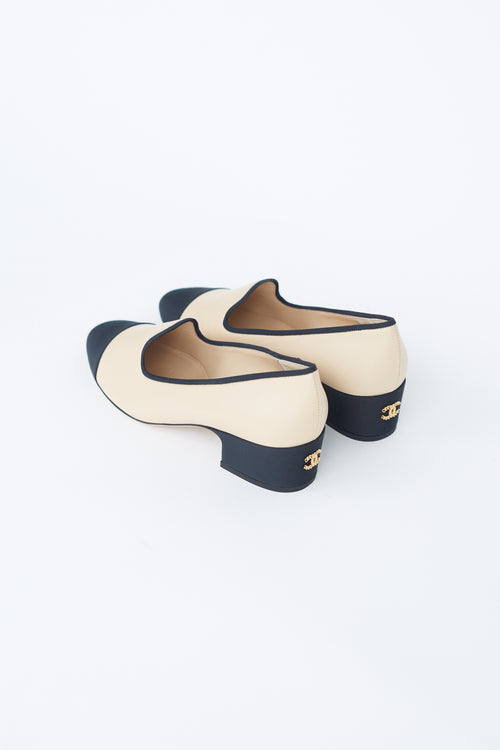 Chanel Beige 
Black Leather Heeled Loafer