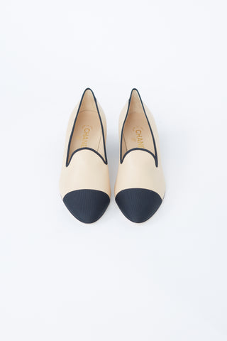 Chanel Beige 
Black Leather Heeled Loafer