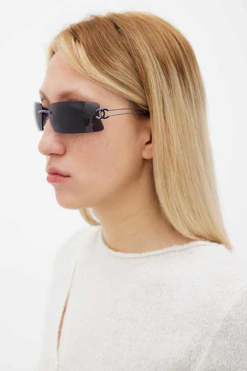 Chanel Silver 
Grey Rimless C180/88 Sunglasses