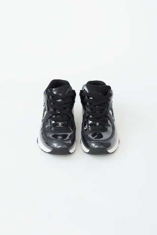 Chanel Black Patent 
Clear PVC CC Sneaker