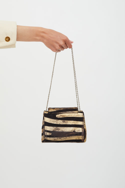 Chanel Brown 
Gold Textured Crossbody Bag