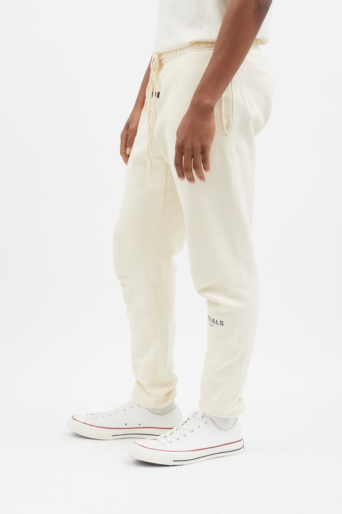 Essentials Cream 
Grey Logo Stamp Lounge Pant