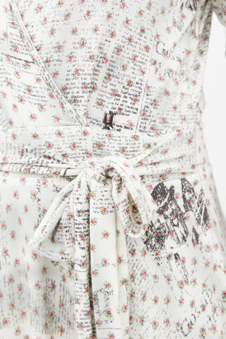 Galliano White Floral 
Newspaper Print Belted Dress