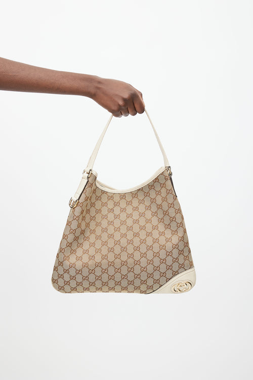 Gucci Brown 
Cream Canvas Monogram Britt Shoulder Bag