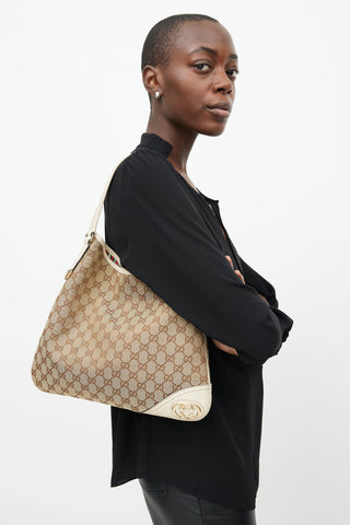 Gucci Brown 
Cream Canvas Monogram Britt Shoulder Bag