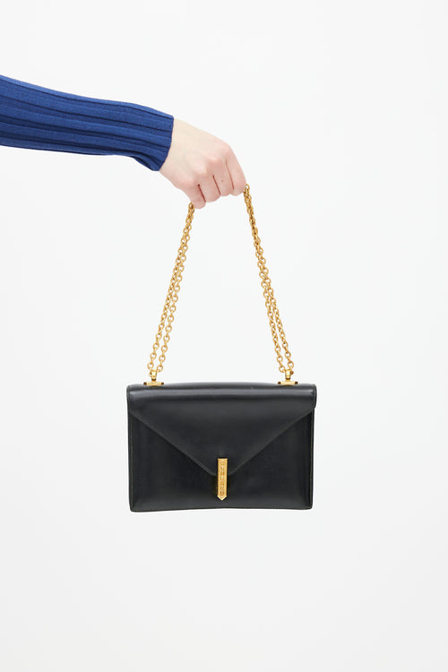 Hermes Black Leather 
Gold-Tone Chain Alcazar Shoulder Bag