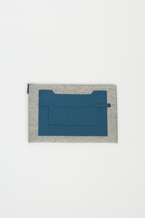 Hermès Grey Felt 
Blue Leather Toodoo Pouch