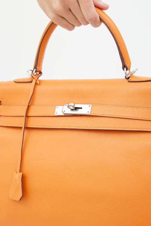 Hermès 2011 Orange Retourne Kelly 35 Leather Bag