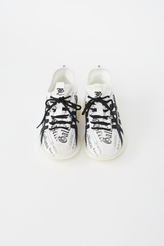 John Galliano White 
Black Newspaper Print Knit Sneaker