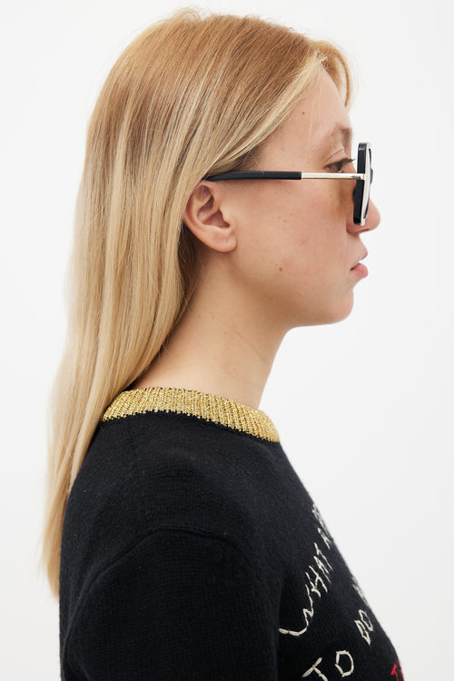 Karen Walker Black 
Yellow Tinted Eden Oversized Sunglasses