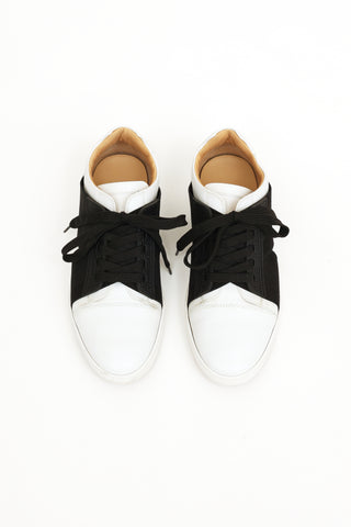 Christian Louboutin White 
Black Bandaged Sneaker