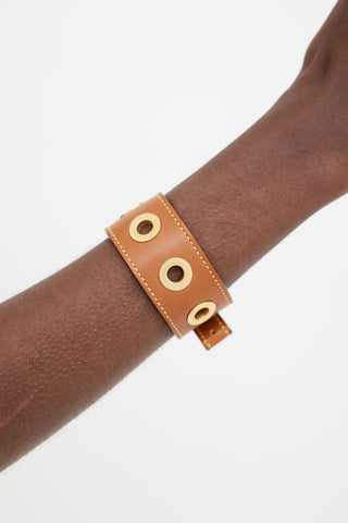 Louis Vuitton Brown 
Gold Leather Grommet Bracelet