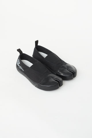 Maison Margiela Black Canvas 
Rubber Tabi Flat