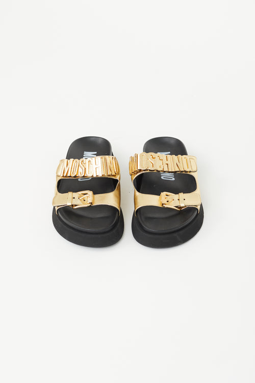 Moschino Black 
Gold Logo Slide