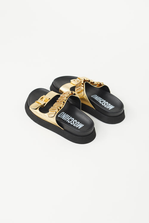 Moschino Black 
Gold Logo Slide