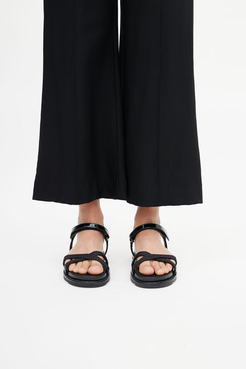 Prada Black Webbing 
Patent Leather Flatform Sandals