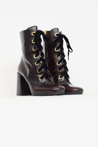 Prada Burgundy 
Gold Tone Ankle Boot