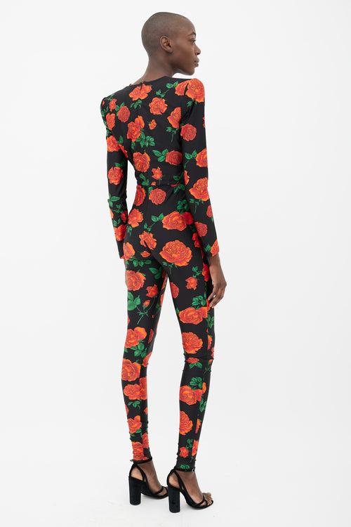 Saint Laurent Black 
Rose Print Long Sleeve Jumpsuit