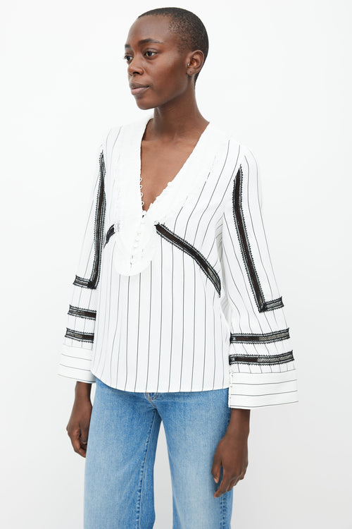 Self Portrait White 
Black Pinstripe Ruffle Blouse