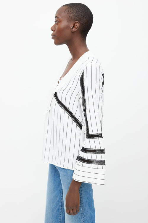 Self Portrait White 
Black Pinstripe Ruffle Blouse